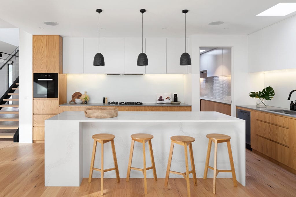 stylish kitchen countertop and stools in a potential first-time buyer home